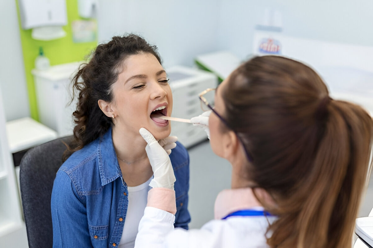 dentist checking the mouth