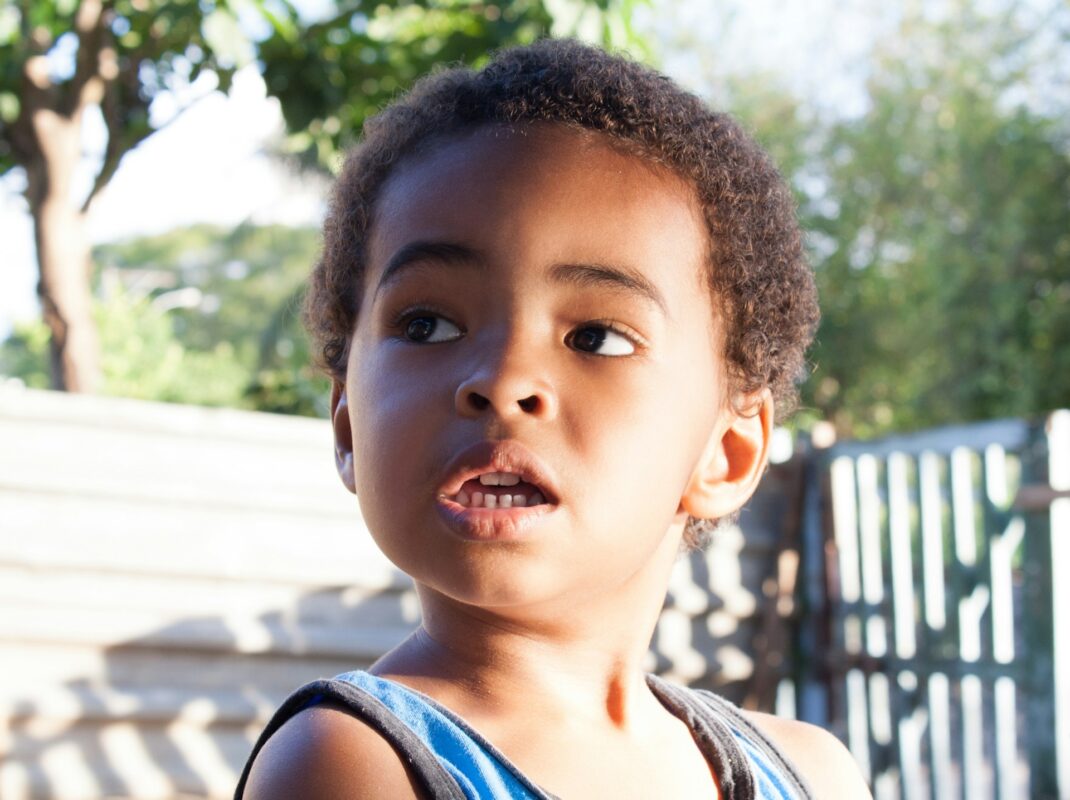 a boy with his mouth open